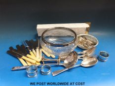 A collection of plated cutlery, grape scissors, salad servers, cut glass and silver plated bowl,