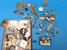 A quantity of costume jewellery to include silver butterfly wing brooches, other silver brooches,