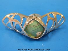 A modern Perrier Jouet hallmarked silver bottle stopper with enamel top,