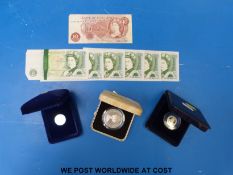 A silver Pobjoy Mint Isle of Man £1 coin in case with certificate,