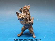 An Austrian cold painted figure of a cat with kitten on its back (height 5.