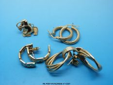 Four pairs of 9ct gold earrings to include three pairs of hoops and a pair in the form of elephants