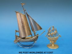 A white metal rocking sailing ship (height 12.