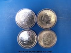 Four Britannia once ounce silver coins 1999,