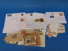 A small quantity of loose stamps and G.