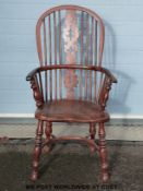 Two elm seated hoop back Windsor chairs,