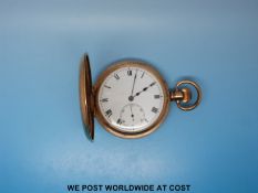 A gold plated half hunter keyless wind pocket watch,