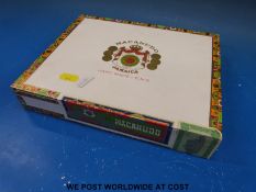 An unopened box of Macanudo cigars