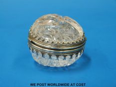A possibly Russian carved rock crystal and white metal mounted trinket or dressing table box with