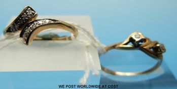 Two 9ct gold rings one set with diamonds in heart shaped settings and the other set with diamonds