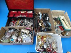 A large collection of costume jewellery including brooches, earrings, watches, white metal items,