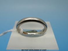 A platinum wedding band (size J, 5.