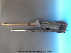 A hallmarked silver and ivory handled parasol, London 1894,