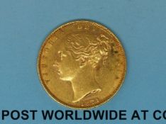 An 1873 young head gold full sovereign shield reverse,