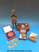 An African style tribal figure, Czechosolovakian Tesla - Brno medal,