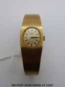 A ladies gold Girard Perregaux ladies wristwatch.