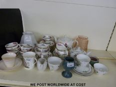A collection of decorative tea cups and saucers