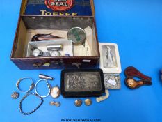 A collection of watches, badges, brooches, lighter, tins, ivory cane top,