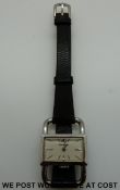 Jaeger le Coultre stainless steel ladies wristwatch with elongated stirrup form lugs white face and
