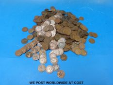 A collection of pre decimal UK pennies,