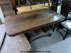 A 19thC mahogany breakfast table with tapering rectangular support (height 74cm width 143cm depth