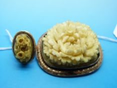 A deeply carved 19thC ivory brooch and ring,