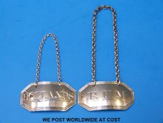 A pair of Georgian hallmarked silver bottle labels for Rum and Hollands, Ldn 1807,