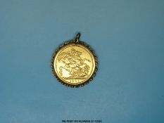 A clip-mounted 1901 gold full sovereign