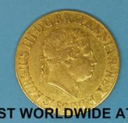 An 1820 George III gold full sovereign,