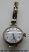 A c1920 - 1930 ladies 'transitional' style wristwatch with white dial,