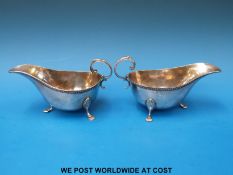 A pair of Asprey & Co silver sauce boats B'ham 1914 (246g)
