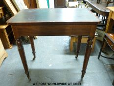 A 19thC mahogany writing table with leather inset top,
