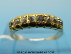 An 18ct gold ring set with eight old cut diamonds (size N)