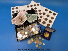 A collection of coins, some silver content,