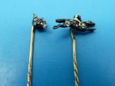 Two yellow metal stick pins, one diamond and enamel formed as a jockey on a horse,
