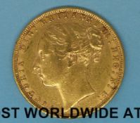 An 1874 young head gold full sovereign,