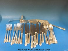 A quantity of silver plated cutlery together with four small napkin or similar rings