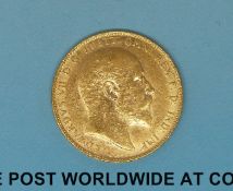 A 1909 gold full sovereign VF/EF