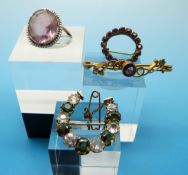 A silver and amethyst ring, yellow metal brooch set with white sapphires and tourmaline,