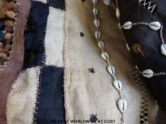 Two Kuba dance skirts with shell decoration and geometric pattern from the Democratic Republic of