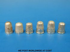 Six various hallmarked silver thimbles