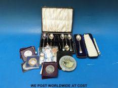 Cased silver spoons, sundry coins and a ballet related compact,
