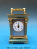 Aiguilles miniature carriage clock with Corinthian columns to corners,