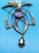 An Edwardian 9ct gold pendant set with amethyst and seed pearls