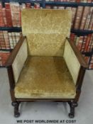 A mahogany inlaid armchair with reeded front columns,