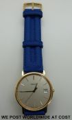 Tissot 14ct gold gentleman's wristwatch with baton numerals and date aperture on blue strap in