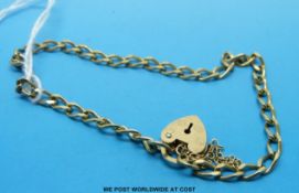 A 9ct gold bracelet with padlock clasp