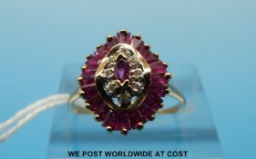 A 9ct gold ring set with rubies and diamonds (size M)