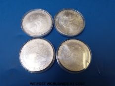 Four USA eagle colourized fine silver one dollar coins,
