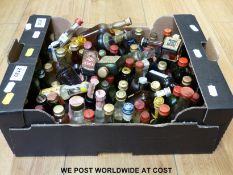 A collection of approximately 50 alcohol miniature liquors to include examples from France